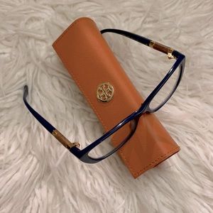 Tory Burch frame, color is blue, with wood and gold metal accents on the temple
